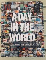A day in the world : ett dygn i tusen bilder