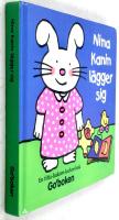 Nina Kanin l&auml;gger sig : en titta-bakom-luckor-bok