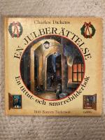 En julber&auml;ttelse : En tittut- och snurrebilderbok