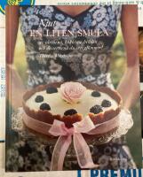 Njut en liten smula : av t&aring;rtorna, kakorna, br&ouml;den och desserterna du inte gl&ouml;mmer!