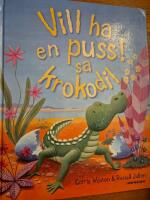 Vill ha en puss! sa krokodil