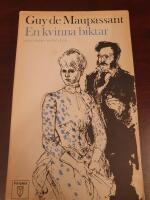 EN KVINNA BIKTAR