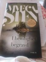 I hemlighet begravd