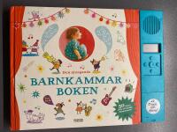 Den sjungande barnkammarboken med l&aring;tar p&aring; spelmodul.