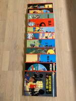 11 TinTins &auml;ventyr:  1) Tintin i Kongo  2) De sju Kristallkulorna del 1  3)  Castafiores Juveler  4) Solens tempel del 2  5) Koks i lasten  6) Krabban med guldklorna  7) TinTin hos gerillan  8) Den svarta &ouml;n  9) TinTin i Amerika  10) Bl&aring; Lotus  11) Det svarta guldet