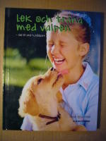 Lek och tr&auml;na med valpen