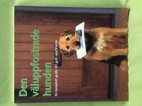 Den v&auml;luppfostrade hunden