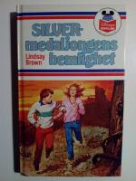 Silvermedaljongens hemlighet