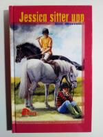 Jessica sitter upp