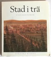 Stad i tr&auml; :- Panelarkitekturen. Ett skede i den svenska sm&aring;stadens byggnadshistoria
