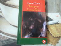 THROUGH THE LOOKING GLASS AND WHAT ALICE FOUND THERE  