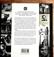 Svart p&aring; vitt om Tio Fotografer