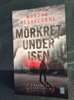 M&ouml;rkret under isen