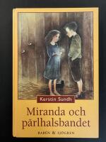 Miranda och p&auml;rlhalsbandet