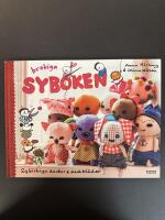 Brokiga syboken : sy brokiga dockor & dockkläder
