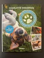 Hundens f&ouml;rsta &aring;r : en handbok f&ouml;r alla hund&auml;gare
