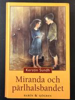 Miranda och p&auml;rlhalsbandet