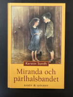 Miranda och p&auml;rlhalsbandet