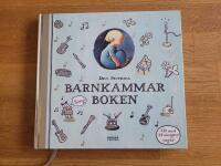 Den silvriga barnkammarboken