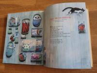 Din f&ouml;rsta bok : ber&auml;ttelser, rim och s&aring;nger f&ouml;r de minsta