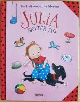 Julia s&auml;tter sig