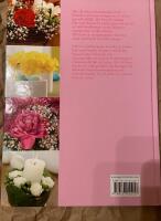 Blommor & servetter : dekorativa blomsterarrangemang och servettbrytningar att g&ouml;ra sj&auml;lv