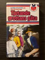 Alfred Hitchcock och Tre deckare l&ouml;ser Tjutande grottans g&aring;ta