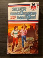 Silvermedaljongens hemlighet