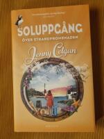 Soluppg&aring;ng &ouml;ver strandpromenaden