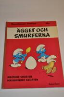 &Auml;gget och smurferna : Den falske smurfen ; Den hundrade smurfen