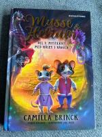 Musse & Helium. Mysteriet med h&aring;let i v&auml;ggen