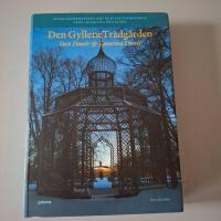 Den gyllene tr&auml;dg&aring;rden : tr&auml;dg&aring;rdskonstens id&eacute;- och kulturhistoria fr&aring;n Adam till &Ouml;rtag&aring;rd