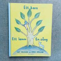 Ett barn, ett lamm, en s&aring;ng
