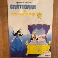 Gn&aring;ttorna och den vita damen