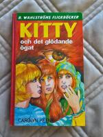 Kitty och det gl&ouml;dande &ouml;gat 