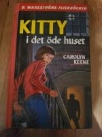 Kitty i det &ouml;de huset