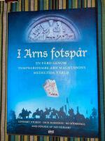 I Arns fotsp&aring;r.