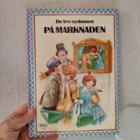 De tre syskonen p&aring; marknaden