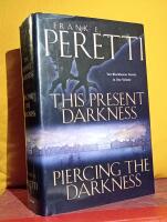 This Present Darkness and Piercing the Darkness &ndash; Two Blockbuster Novels in One Volume &ndash; ["Ondskans n&auml;rvaro" och "Ondskans nederlag" p&aring; engelska, samlingsvolym]