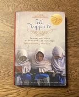 Tre koppar te : en ensam mans str&auml;van att fr&auml;mja fred... en skola i taget