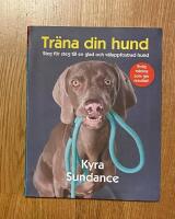 Tr&auml;na din hund: steg f&ouml;r steg till en glad och v&auml;luppfostrad hund