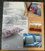 Inred vackert med tyger : Praktiska id&eacute;er och tips f&ouml;r ett personligt hem