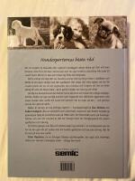 Stora boken om att skaffa och leva med hund : modern tr&auml;ning, beteende och psykologi