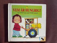 Vem &auml;r hungrig? : [en liten bok med stora luckor!]