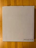 100 Photographs  (in English)