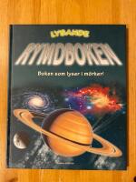 Lysande rymdboken : boken som lyser i m&ouml;rker!