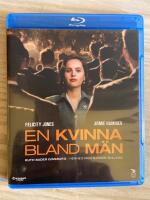 En kvinna bland m&auml;n