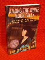 Among the white moon faces