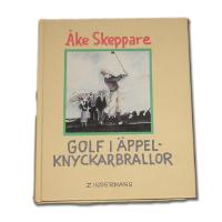 Golf i &auml;ppelknyckarbrallor