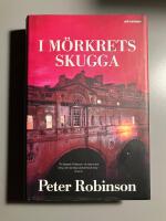 I m&ouml;rkrets skugga